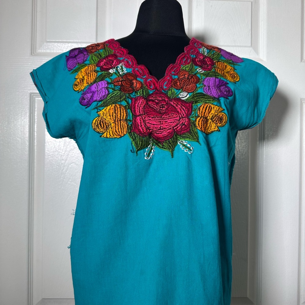Elegant Blue Floral Blouse with Lace Trim and Bell Sleeves